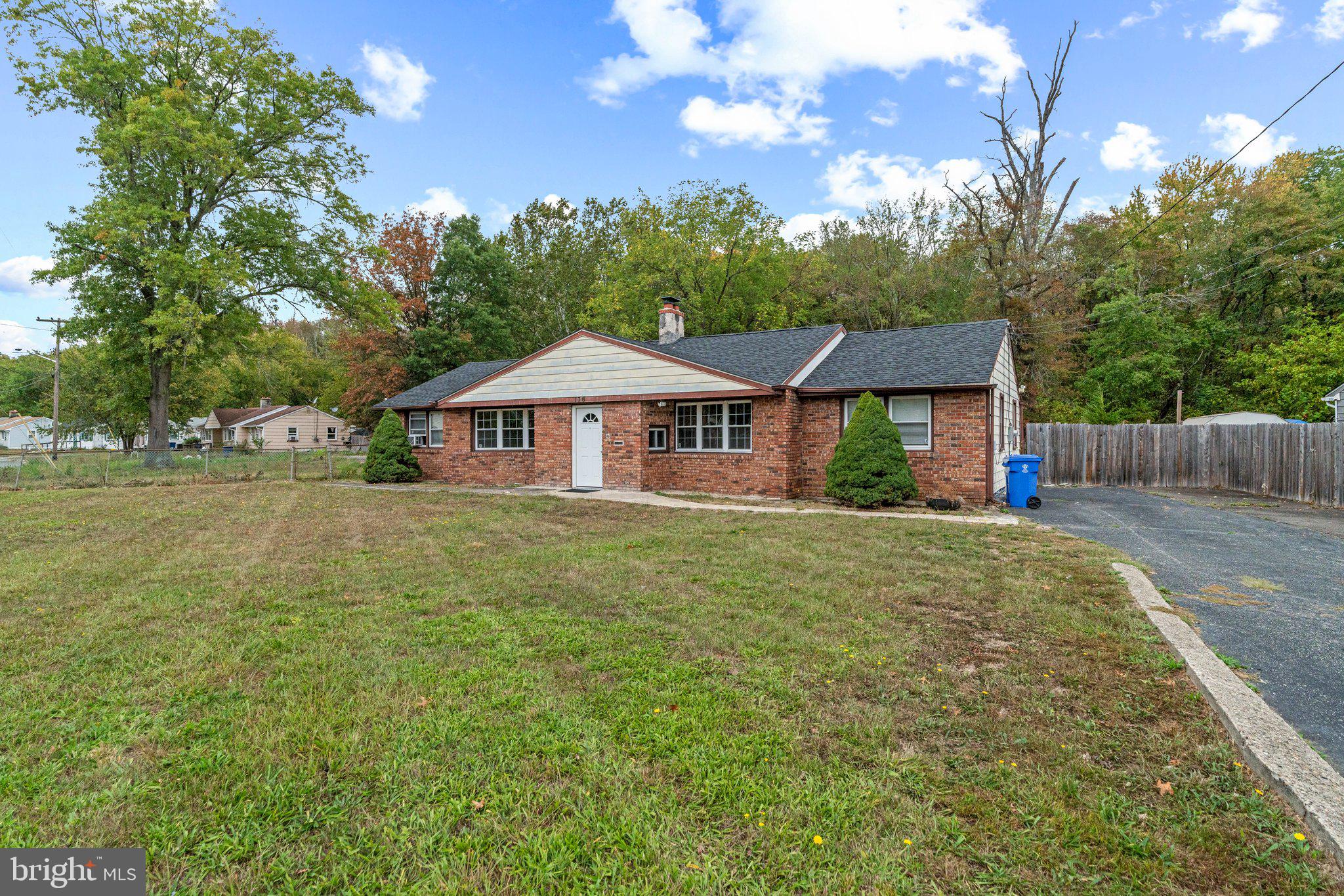 176 Lemmon Avenue Pemberton, NJ 08068 - Photo 2 of 20 a backyard of a house with table and chairs