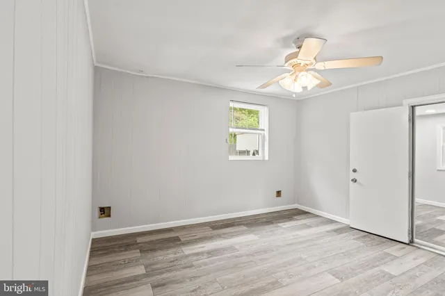 a kitchen with stainless steel appliances a stove a sink and a microwave