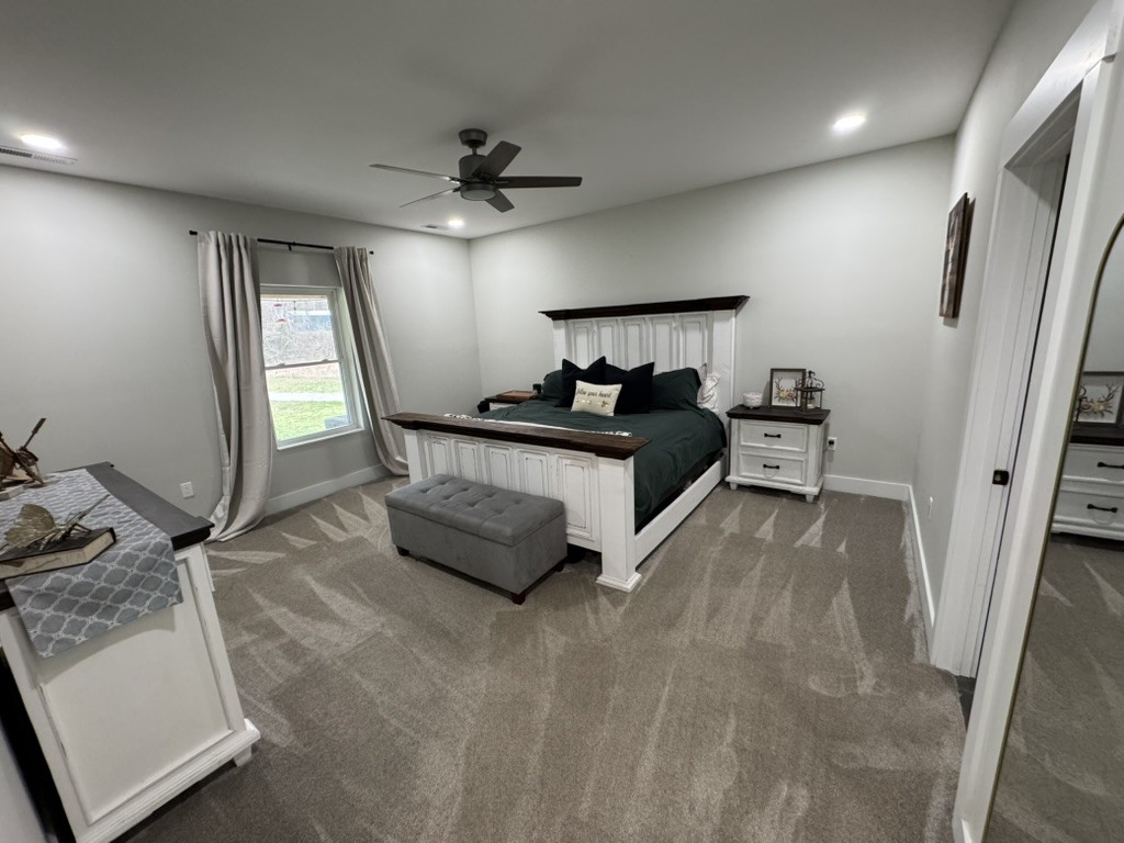 767 Potter Road Dickson, TN 37055 - Photo 13 of 30 a bedroom with bed and window