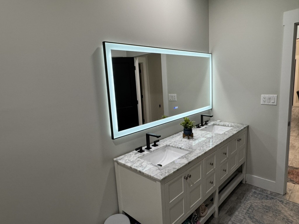 767 Potter Road Dickson, TN 37055 - Photo 24 of 30 a bathroom with a sink and a mirror