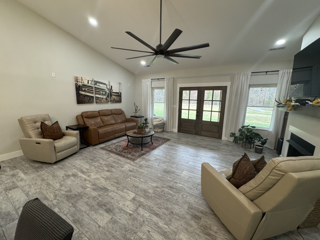 767 Potter Road Dickson, TN 37055 - Photo 5 of 30 a living room with furniture and a flat screen tv