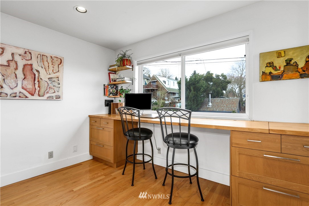 2418 East Roy Street Seattle, WA 98112 - Photo 12 of 32 a view of a dining room with furniture window and outside view