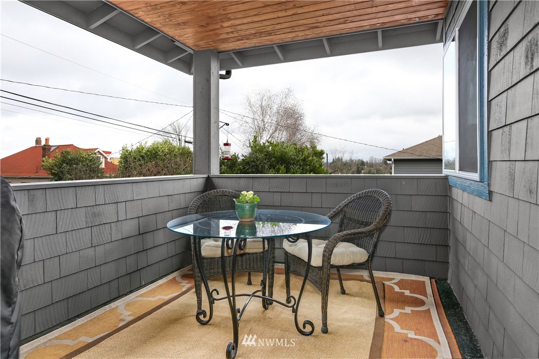 2418 East Roy Street Seattle, WA 98112 - Photo 27 of 32 a view of a outdoor seating area with furniture
