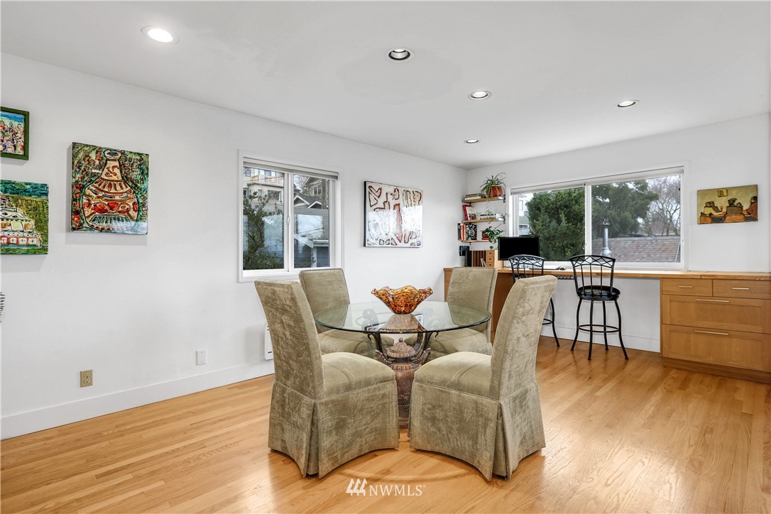 2418 East Roy Street Seattle, WA 98112 - Photo 10 of 32 a living room with furniture and a wooden floor