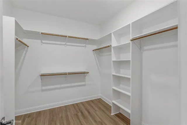 a view of an empty walk in closet