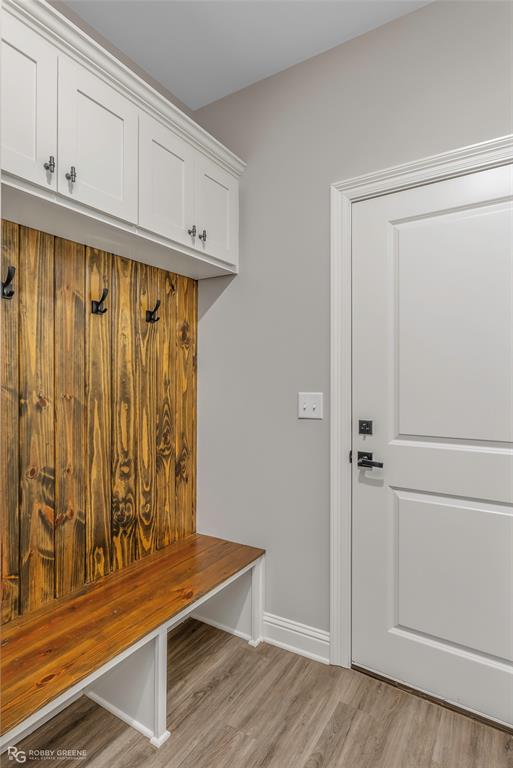 1013 VOSS Road Stonewall, LA 71078 - Photo 24 of 32 a view of a room with wooden floor and cabinet