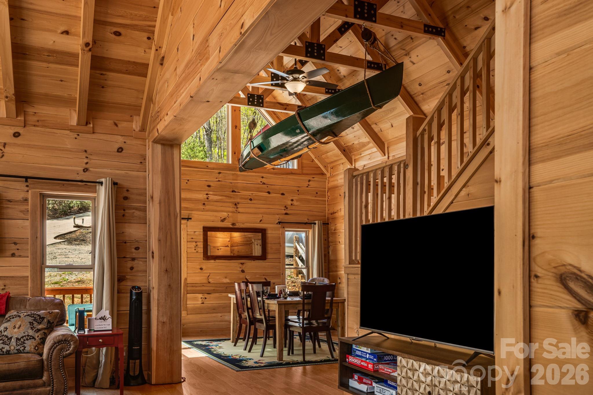 67-69 Flat Top Mountain Road Fairview, NC 28730 - Photo 17 of 43 a view of a living room and a flat screen tv