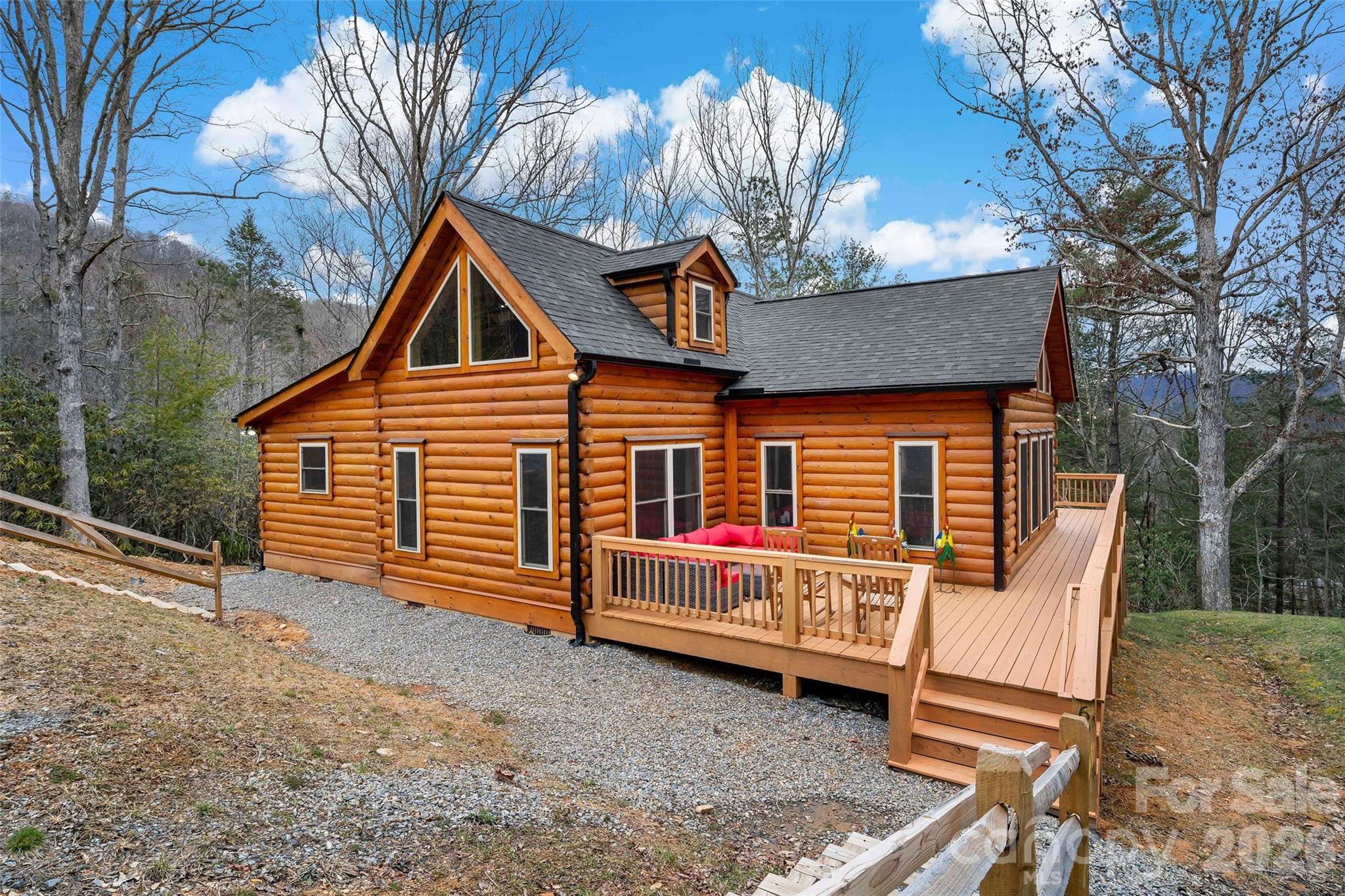 67-69 Flat Top Mountain Road Fairview, NC 28730 - Photo 10 of 43 a view of a house with a yard