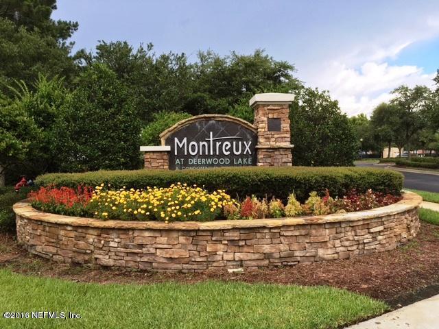 8550 Touchton Road, Unit 636 Jacksonville, FL 32216 - Photo 1 of 11 a view of a wooden house with a yard