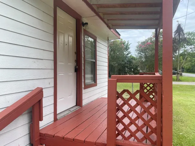 a view of a street from a balcony