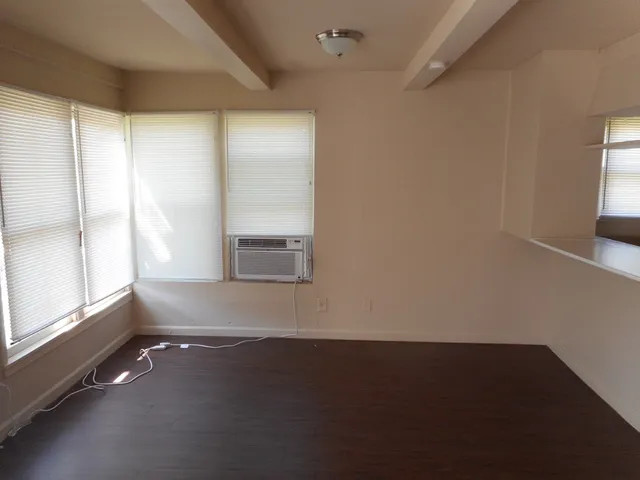 en empty room with windows