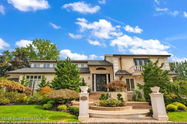 an aerial view of a house with a garden