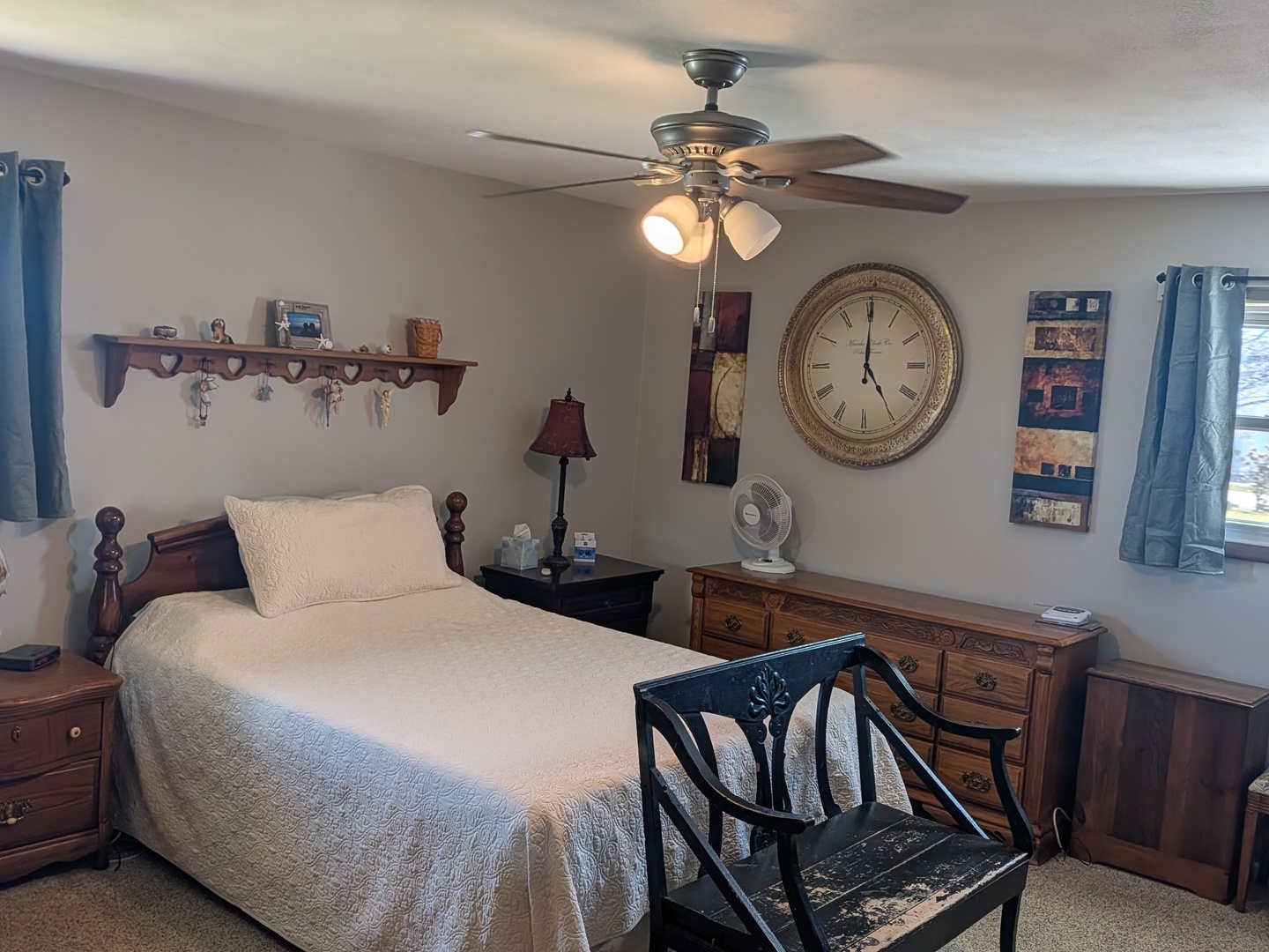 4 James Court Minier, IL 61759 - Photo 11 of 16 a bedroom with bed a clock and a wall painting