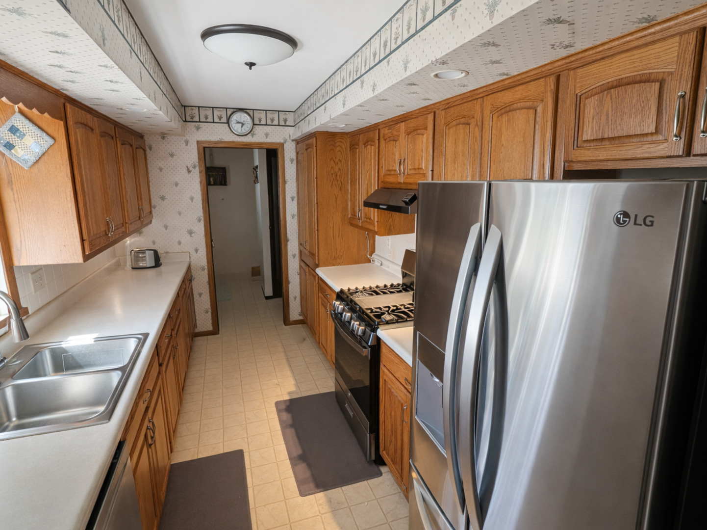4 James Court Minier, IL 61759 - Photo 5 of 16 a kitchen with stainless steel appliances granite countertop a refrigerator and a sink