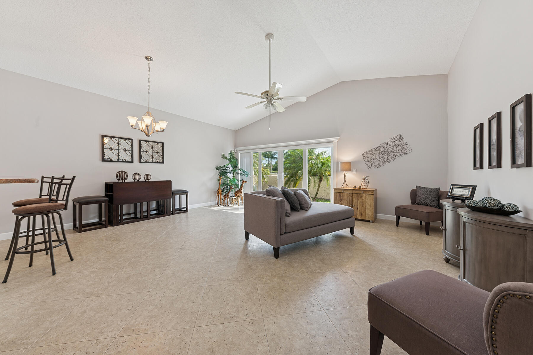 6276 Sweet Maple Lane Boca Raton, FL 33433 - Photo 3 of 14 a living room with furniture a dining table and a window
