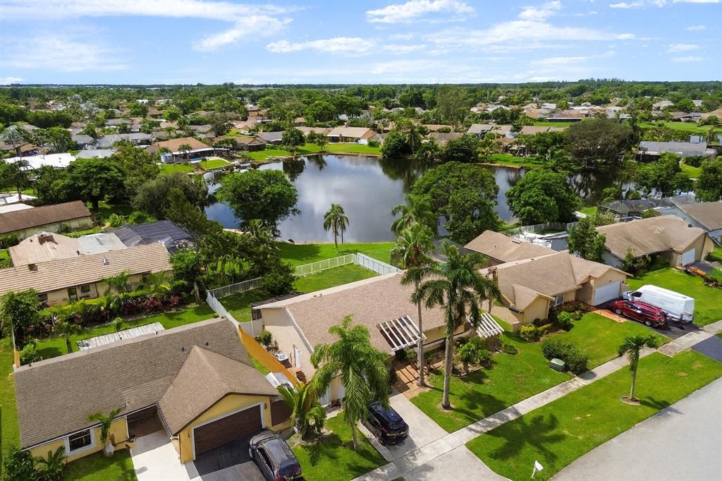 9477 Burlington Place Boca Raton, FL 33434 - Photo 1 of 40 an aerial view of multiple house