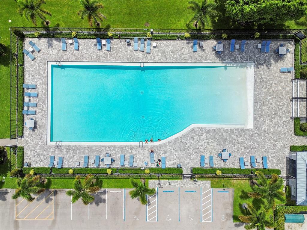 9477 Burlington Place Boca Raton, FL 33434 - Photo 27 of 40 a view of a table and chairs in patio