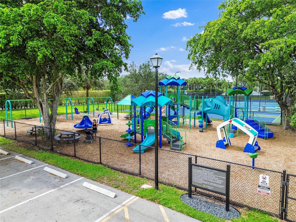9477 Burlington Place Boca Raton, FL 33434 - Photo 30 of 40 an outdoor space with seating