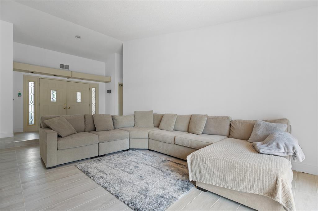 9477 Burlington Place Boca Raton, FL 33434 - Photo 6 of 40 a living room with furniture and a couch