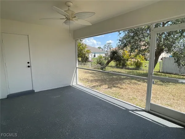 a view of a room with a large window