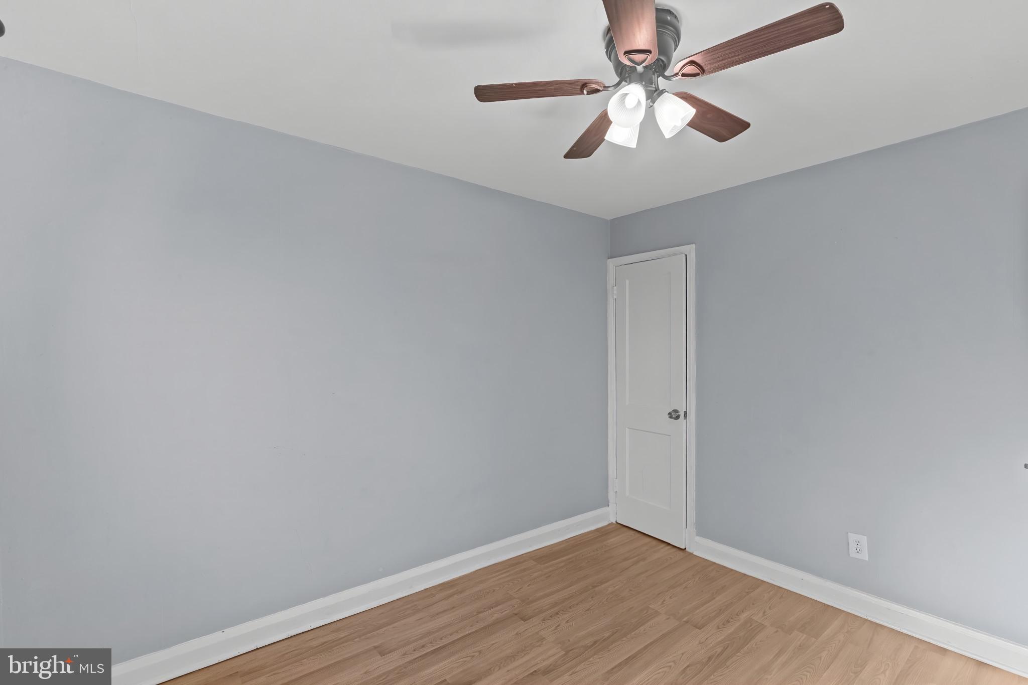 749 South Woodington Road Baltimore, MD 21229 - Photo 13 of 18 a view of a room with a fan