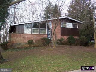 156 Yew Road Cheltenham, PA 19012 - Photo 1 of 1 a front view of a house with garden