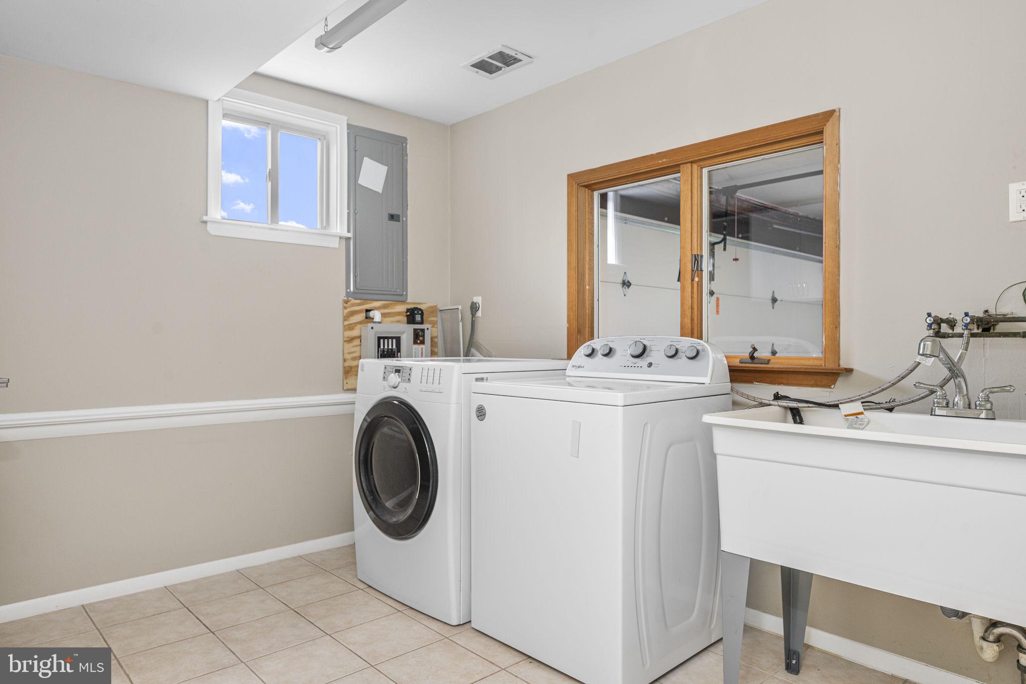 304 Crump Road Exton, PA 19341 - Photo 29 of 30 Bright and functional laundry space.