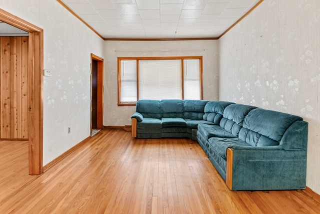 3047 South Broad Street Chicago, IL 60608 - Photo 4 of 25 a living room with furniture and a large window