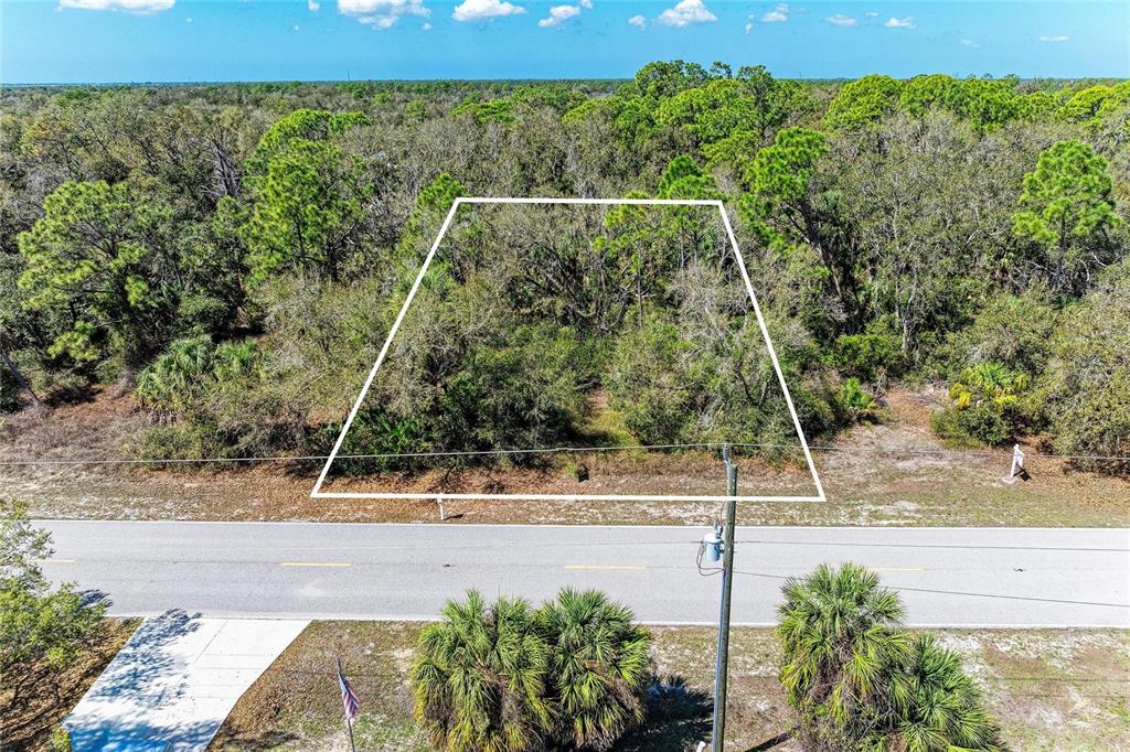 3067 Como Street Port Charlotte, FL 33948 - Photo 1 of 15 a view of a yard
