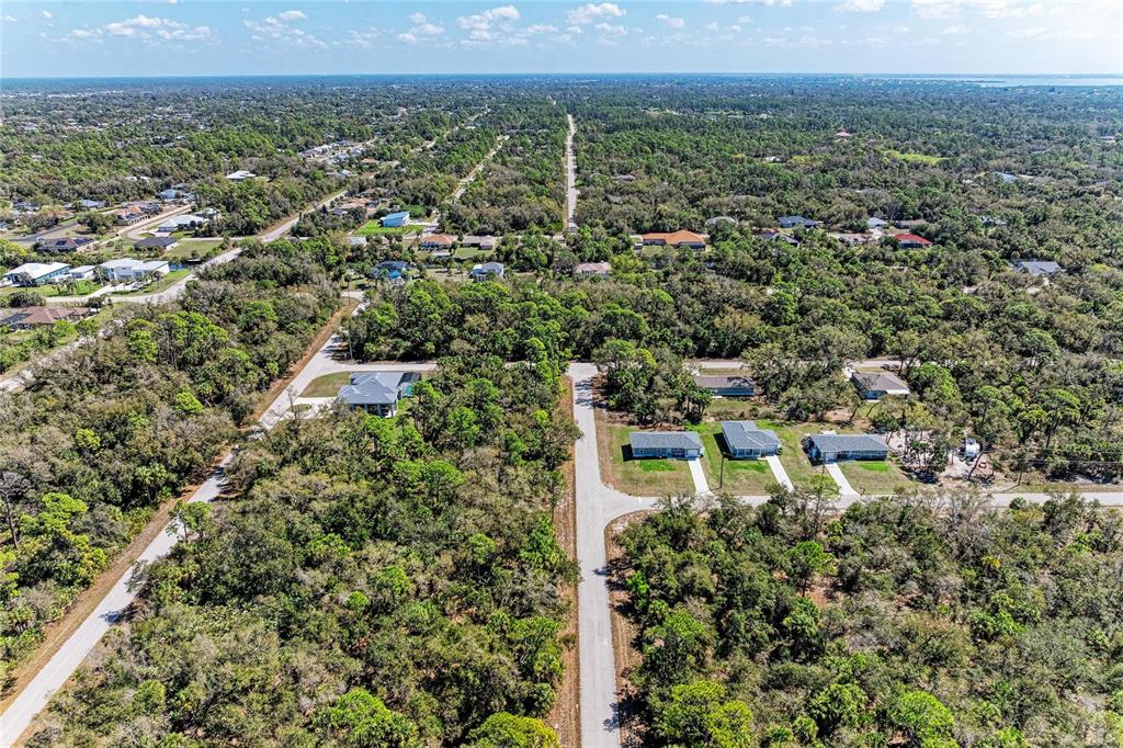 3067 Como Street Port Charlotte, FL 33948 - Photo 7 of 15 a view of a lake with mountain
