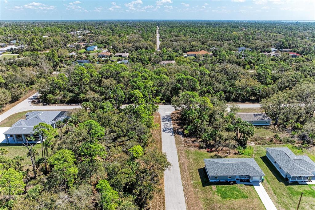 3067 Como Street Port Charlotte, FL 33948 - Photo 10 of 15 an aerial view of a house with a yard