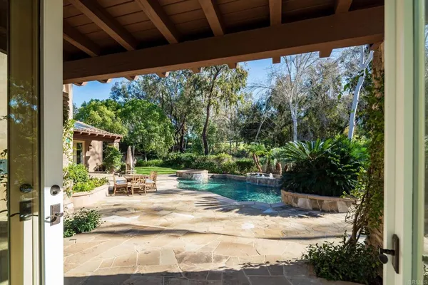 a view of swimming pool from a porch