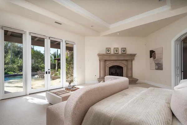 a bed room with a bed and a fireplace