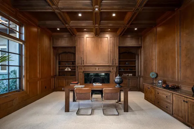 a outdoor space with patio furniture and a fireplace