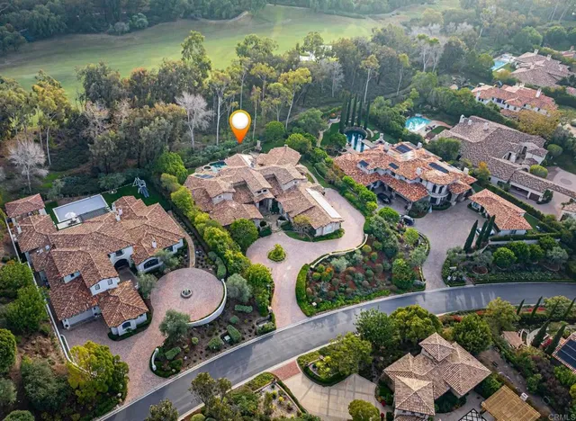 an aerial view of city and lake