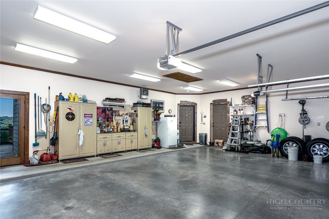 171 Camp Davis Road Banner Elk, NC 28604 - Photo 39 of 48 a view of a room with gym equipment