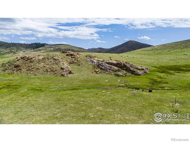 a view of an ocean and a mountain