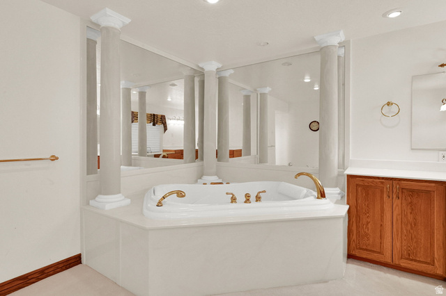 1085 Windsor Drive Provo, UT 84604 - Photo 32 of 83 Full bathroom featuring a garden tub and vanity