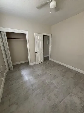a view of a hallway with white walls