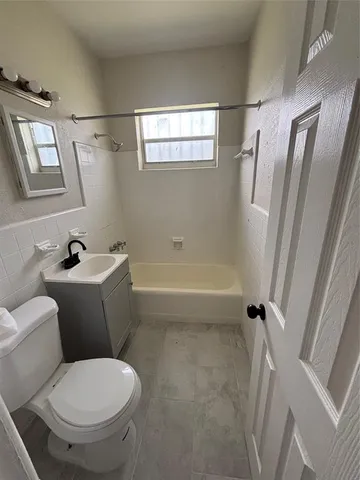 a picture of a park with a bench