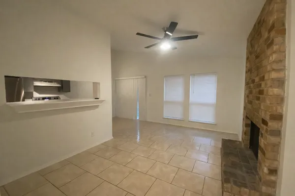 a utility room with cabinets dryer and washer