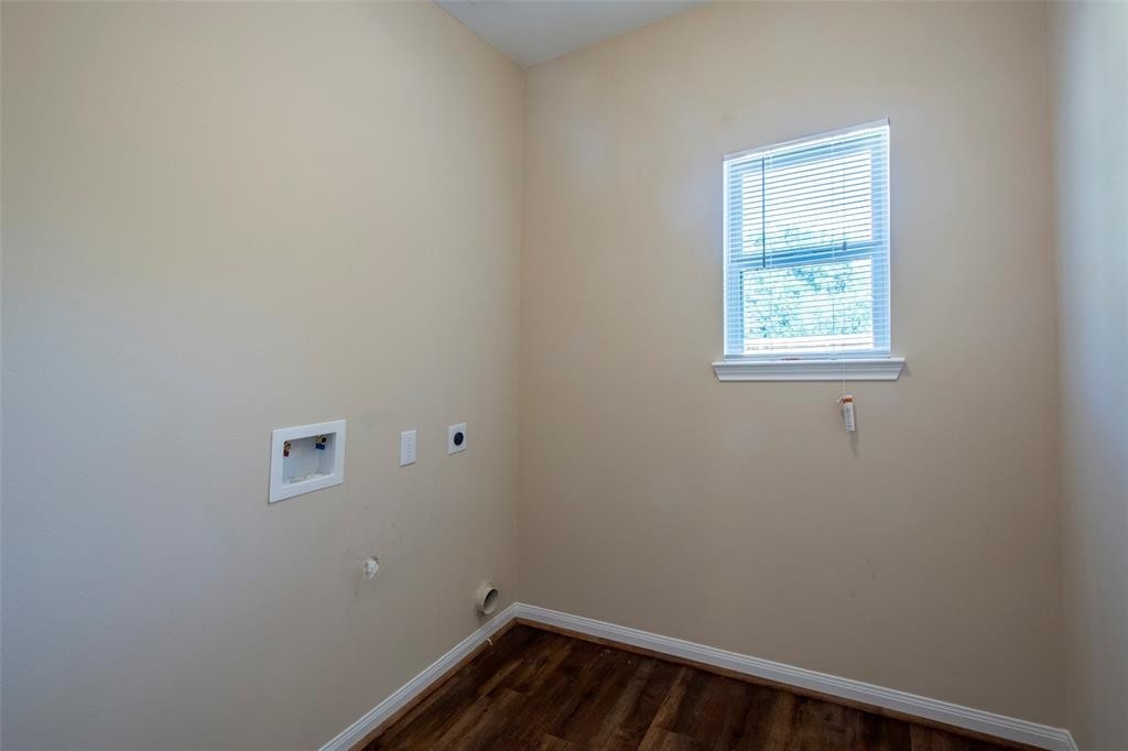 8142 Cabot Street, Unit A Houston, TX 77078 - Photo 13 of 21 an empty room with a window