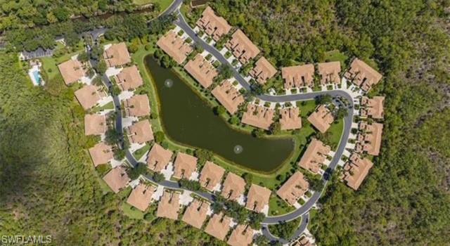 866 Carrick Bend Circle, Unit 201 Naples, FL 34110 - Photo 33 of 35 an aerial view of a house