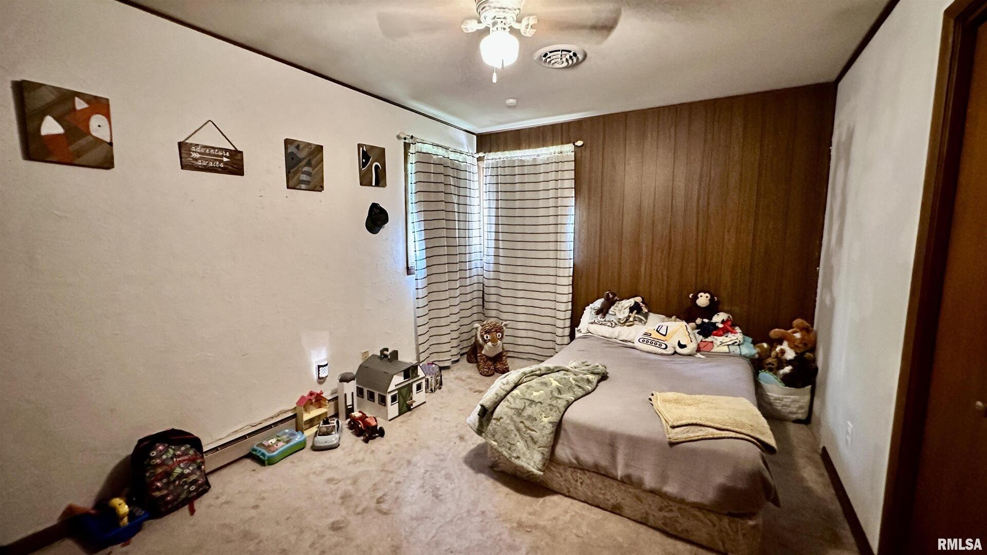 909 North Road West Frankfort, IL 62896 - Photo 21 of 28 a bedroom with bed and a window