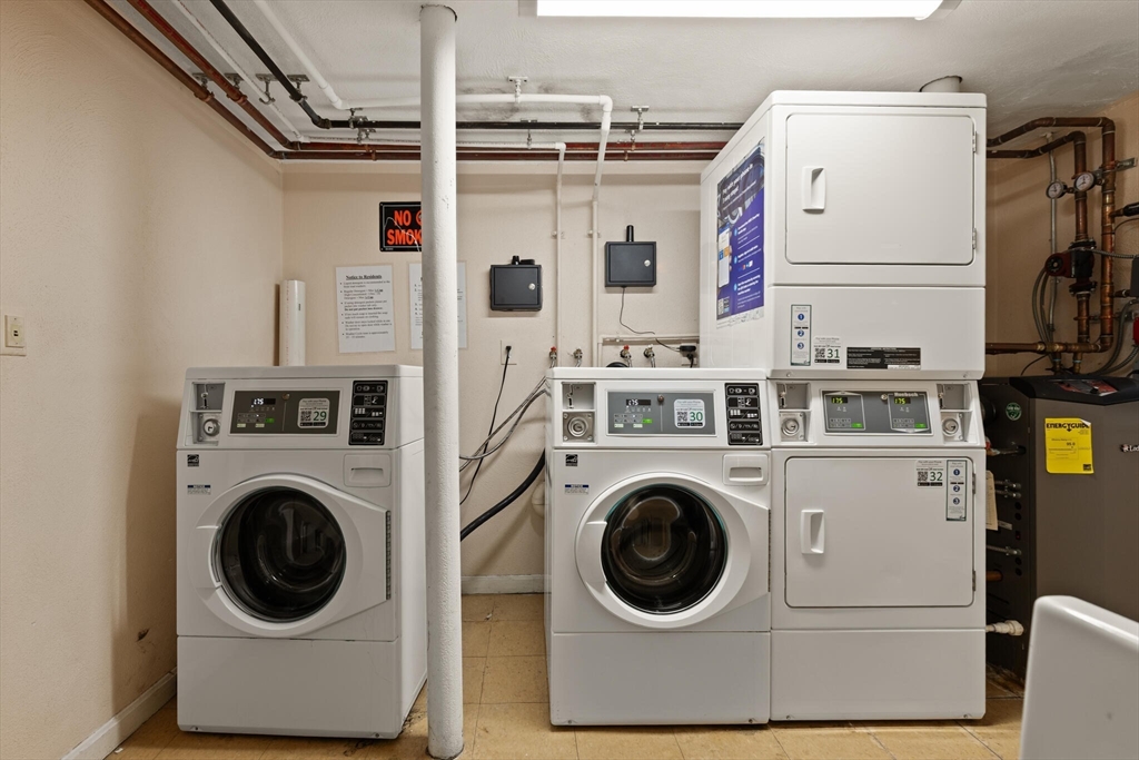 88 Gordon Street, Unit 402 Boston, MA 02135 - Photo 13 of 15 a utility room with dryer and washer