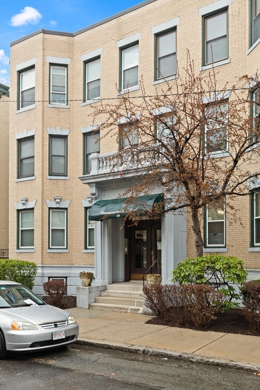 88 Gordon Street, Unit 402 Boston, MA 02135 - Photo 14 of 15 a view of a car park in front of a building