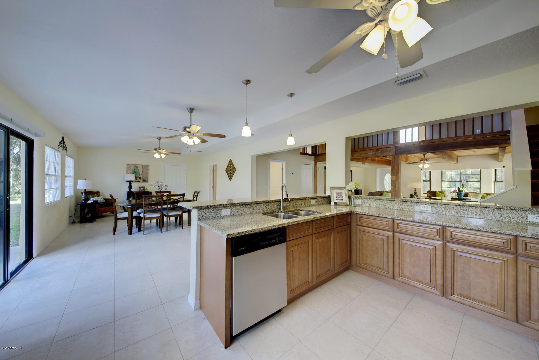 1940 Trimble Road Melbourne, FL 32934 - Photo 22 of 34 Kitchen open to Great Room