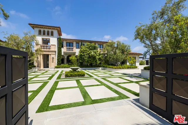 a view of a house with swimming pool
