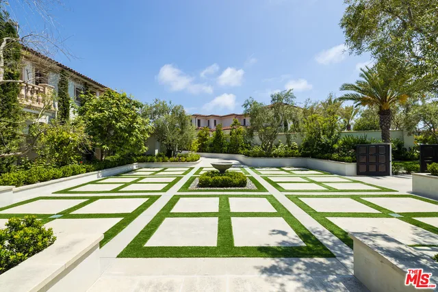 a view of a swimming pool with a lounge chairs