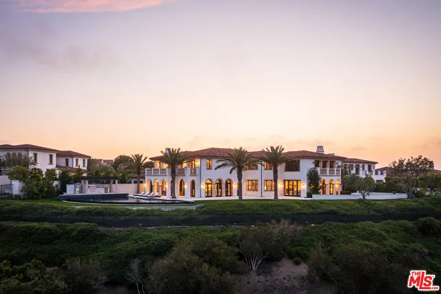 a view of houses with outdoor space and garden
